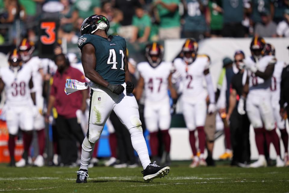 Philadelphia Eagles linebacker Nicholas Morrow (41) reacts after sacking Washington Commanders quarterback Sam Howell during the second half of an NFL football game Sunday, Oct. 1, 2023, in Philadelphia. (AP Photo/Matt Slocum)