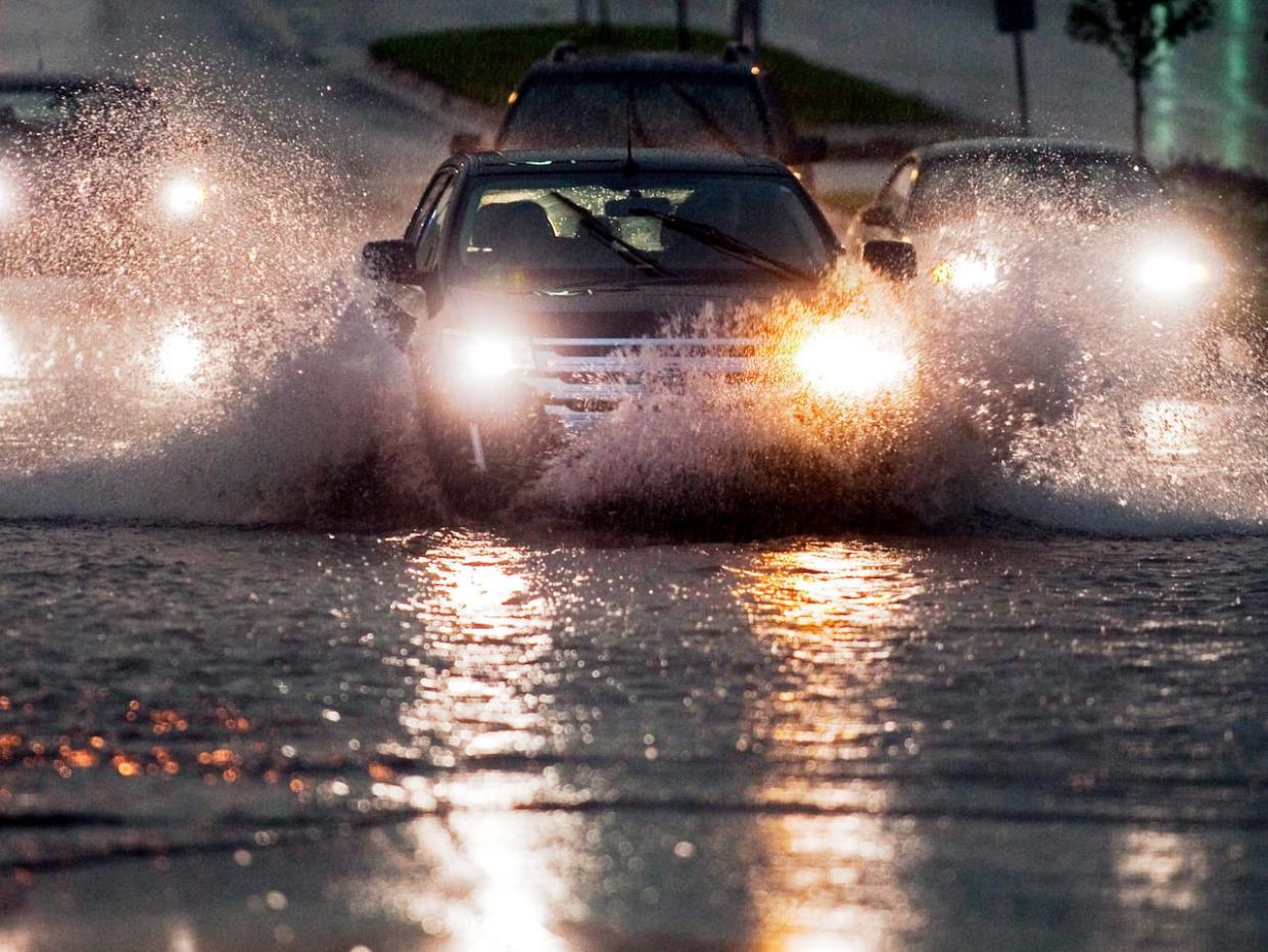 Rainfall warnings are in place for much of the Maritimes as tropical storm Franklin makes its way south of the region from Bermuda. (Andrew Vaughan/The Canadian Press - image credit)