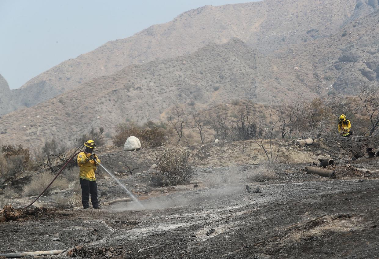 Cal Fire crews work to put out hot spots left over from the Water Fire at Whitewater Canyon Preserve, August 3, 2020.