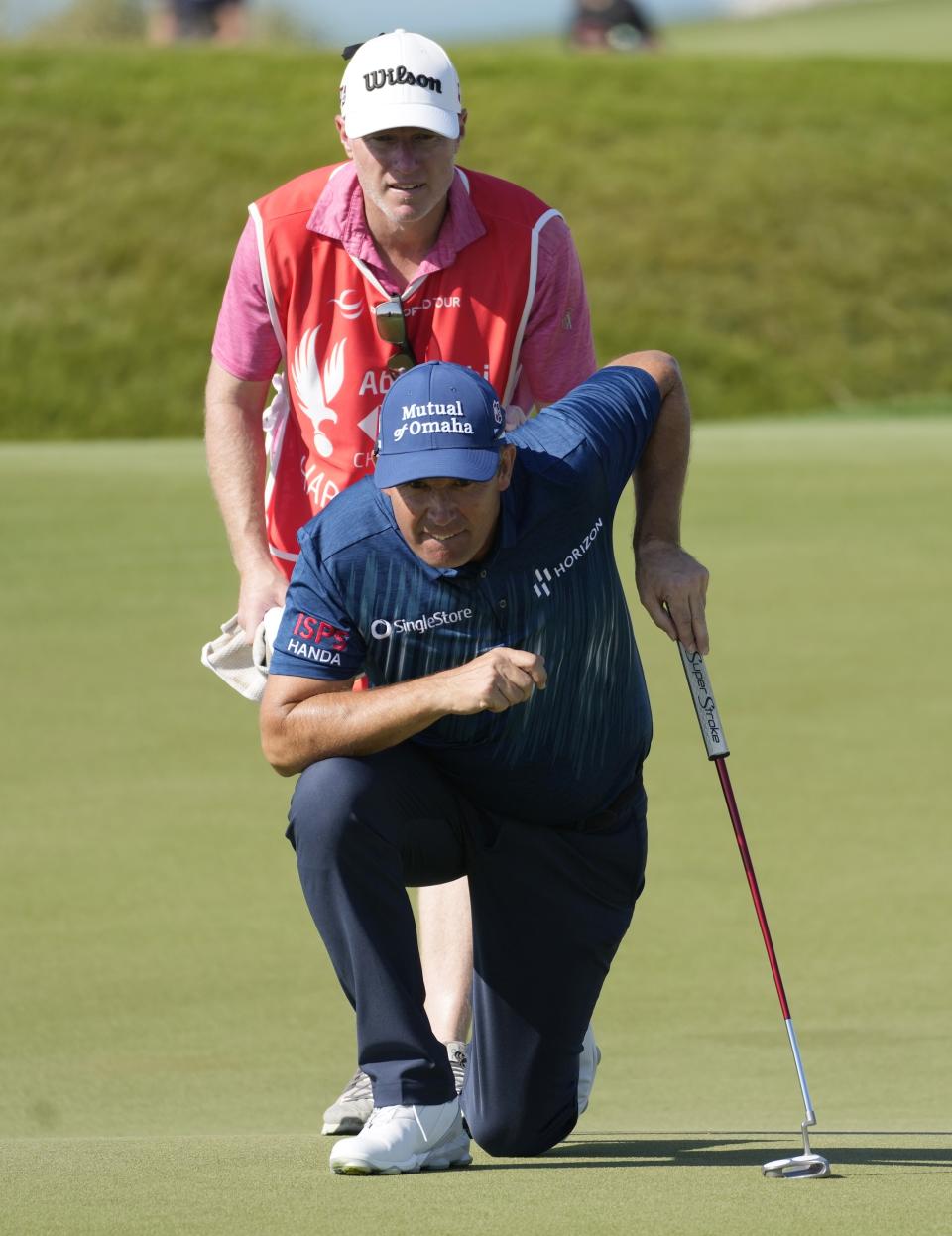 Padraig Harrington of Ireland studies his shot on 10th hole during the final round of Abu Dhabi HSBC Golf Championship, in Abu Dhabi, United Arab Emirates, Sunday, Jan. 22, 2023. (AP Photo/Kamran Jebreili)