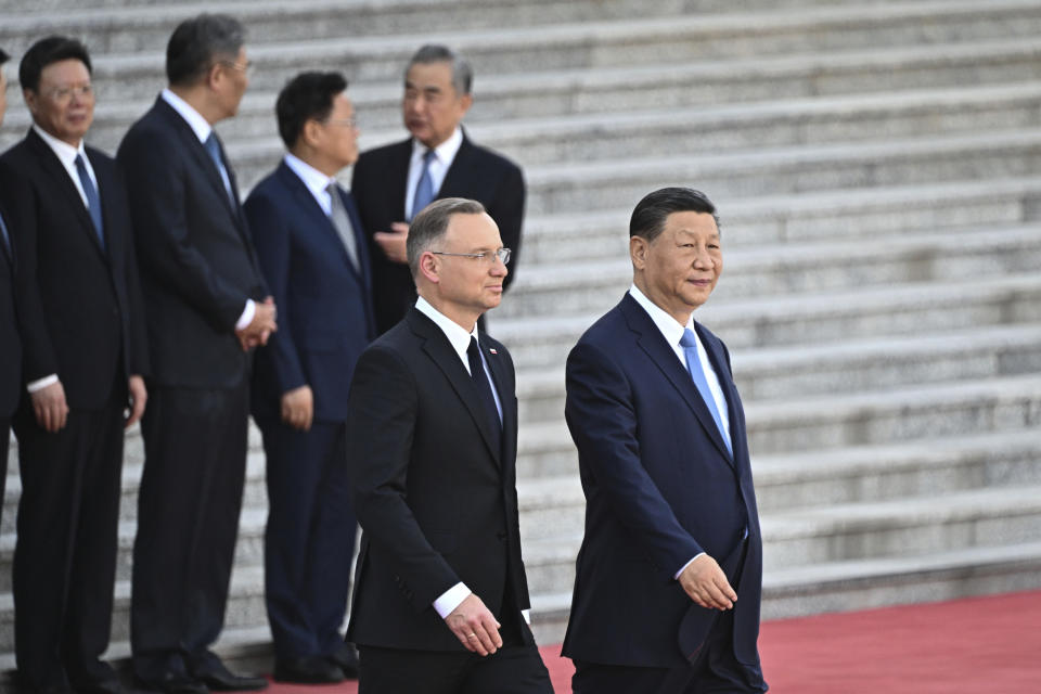 Chinese President Xi Jinping, right and Poland's President Andrzej Duda attend the welcome ceremony at the Great Hall of the People in Beijing, Monday, June 24, 2024. (Pedro Pardo/Pool Photo via AP)