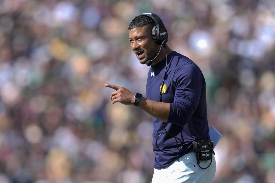 Notre Dame head coach Marcus Freeman gestures after a touchdown against Purdue during the first half of an NCAA college football game in West Lafayette, Ind., Saturday, Sept. 14, 2024. (AP Photo/Michael Conroy)