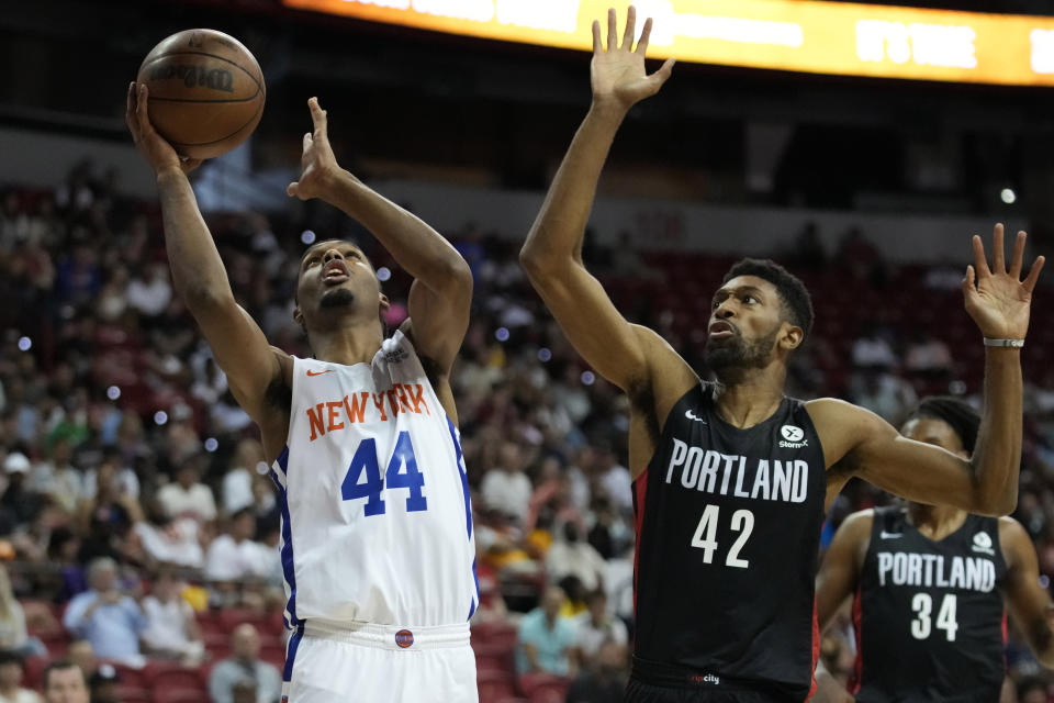 New York Knicks' Feron Hunt shoots against Portland Trail Blazers' Kyle Alexander during the first half an NBA summer league championship basketball game Sunday, July 17, 2022, in Las Vegas. (AP Photo/John Locher)