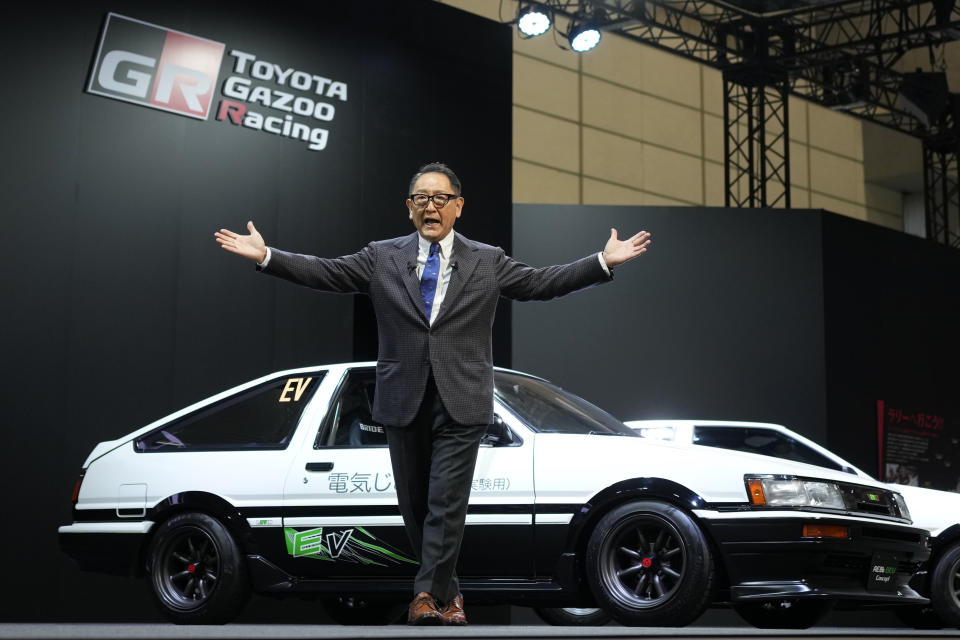 Toyota Motor Corp. Chief Executive Akio Toyoda delivers a speech on the stage at the Tokyo Auto Salon, an industry event similar to the world's auto shows Friday, Jan. 13, 2023, in Chiba near Tokyo. (AP Photo/Eugene Hoshiko)