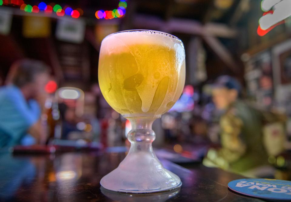 One of Schooners distinctive frosted beer mugs sits on the bar at the popular Peoria Heights restaurant on War Memorial Drive.