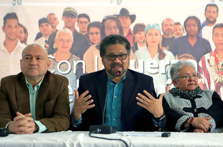 Ivan Marquez and Carlos Antonio Lozada of the political party of the FARC speak during a news conference in Bogota, Colombia March 8, 2018. REUTERS/Jaime Saldarriaga