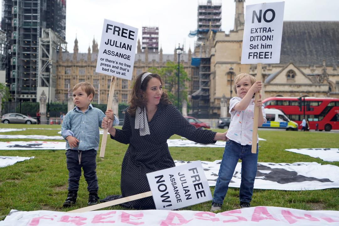 Partner of Wikileaks founder Julian Assange, Stella Moris, (C), with their children Gabriel (R) and Max, attends a picnic in Parliament Square, central London on July 3, 2021, to mark his 50th birthday. (Photo by Niklas HALLE'N / AFP) (Photo by NIKLAS HALLE'N/AFP via Getty Images)