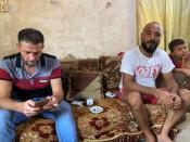 Chamseddine Khaled Kerdi and Mohammed Ghandour are pictured inside a room in Tripoli