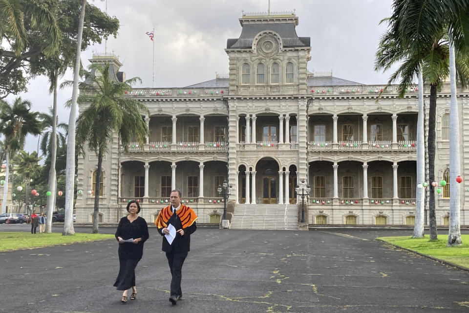 Paula Akana, left, executive director of ʻIolani Palace, and Hailama Farden, of Hale O Nā Aliʻi O Hawaiʻi, a royal Hawaiian society, arrive at a news conference Monday, Dec. 12, 2022, at the palace in Honolulu to announce the death of Abigail Kinoiki Kekaulike Kawānanakoa at the age of 96. Kawānanakoa, the so-called last Hawaiian princess whose lineage included the royal family that once ruled the islands and an Irish businessman who became one of Hawaii's largest landowners, died on Sunday, Dec. 11, 2022. (AP Photo/Jennifer Sinco Kelleher)