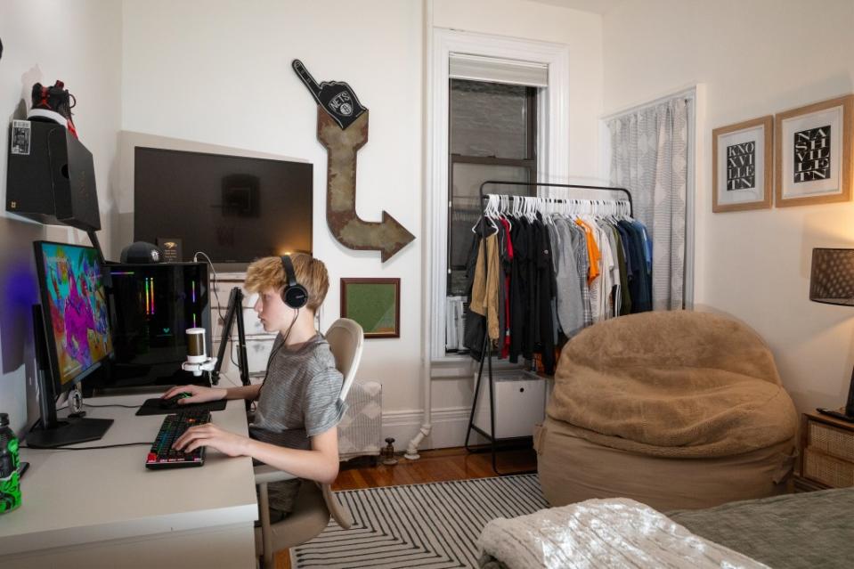 Cooper Miller, 12, in his bedroom. OLGA GINZBURG FOR THE NEW YORK POST