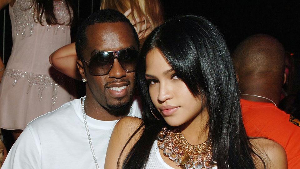 Sean Diddy Combs and Cassie wear white shirts to party.