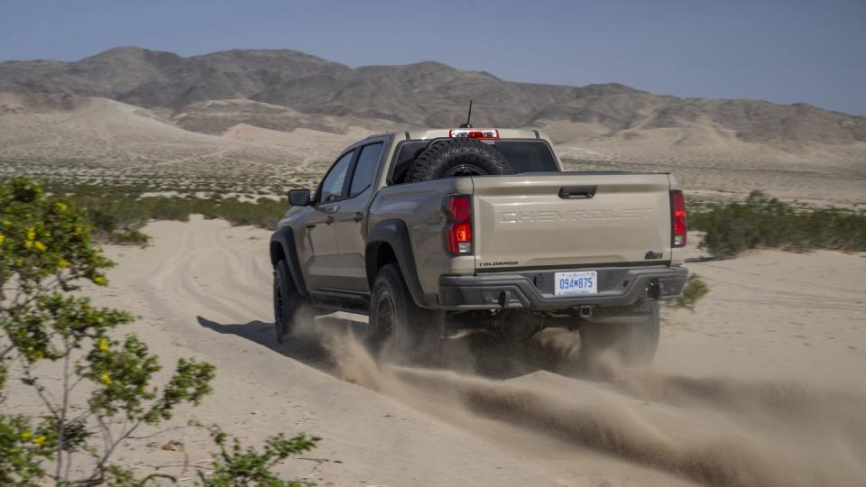 the 2024 colorado zr2 bison in motion driving through the desert