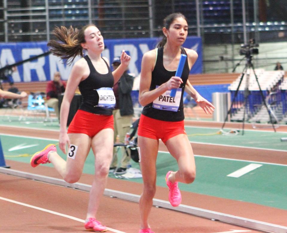 Scarsdale's Zoe Dichter pulls up after handing the baton to teammate Leia Patel during the girls 4x800 relay championship at The Armory March 9, 2024. Scarsdale gained all-American honors in fourth place.