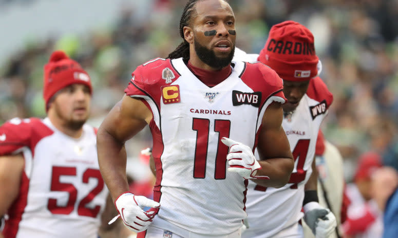 Larry Fitzgerald runs off the field.