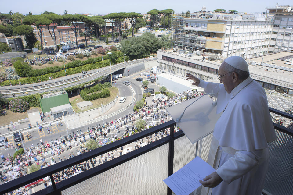 Pope Francis appears at a balcony of the Agostino Gemelli Polyclinic in Rome, Sunday, July 11, 2021, where he was hospitalized for intestine surgery, to deliver his traditional Sunday blessing. (Vatican Media via AP)