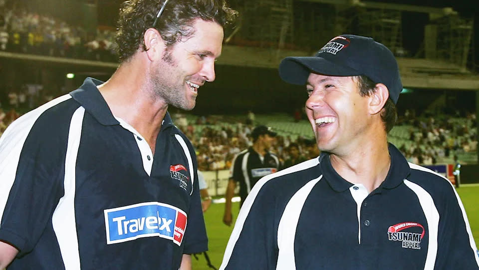 Chris Cairns and Ricky Ponting share a laugh at the World Cricket Tsunami Appeal match in 2005. (Photo by Hamish Blair/Getty Images)
