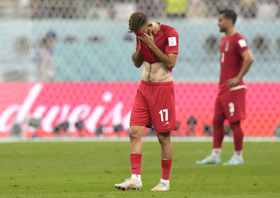 Iran's Ali Gholizadeh reacts during the World Cup group B soccer match between England and Iran at the Khalifa International Stadium in Doha, Qatar, Monday, Nov. 21, 2022. (AP Photo/Alessandra Tarantino)