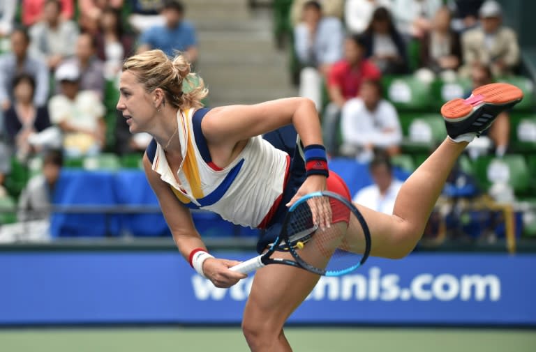 Anastasia Pavlyuchenkova of Russia serves against Angelique Kerber of Germany during their Pan Pacific Open semi-final match, in Tokyo, on September 23, 2017