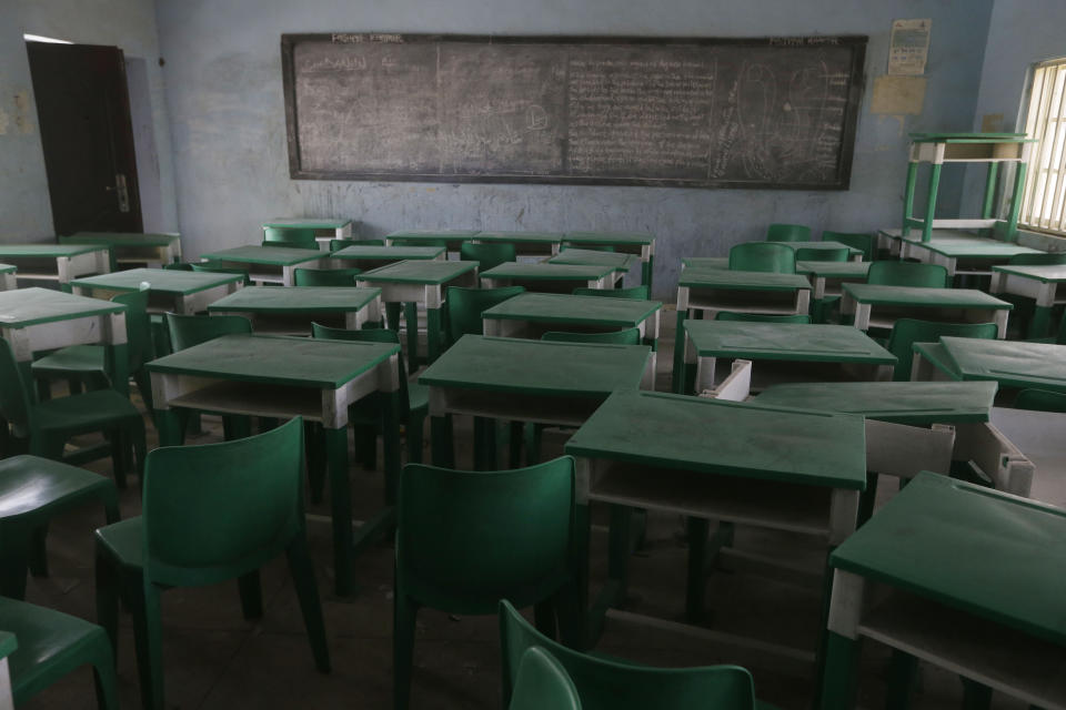 Empty desks and chairs are seen at the Government Girls Secondary School where more than 300 girls were abducted by gunmen in March. Source: AP