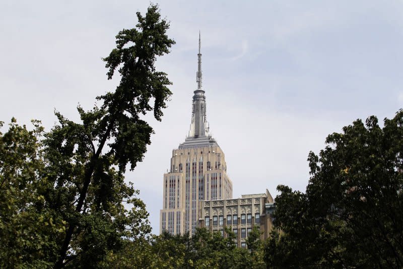 On July 28, 1945, a military plane crashed into the Empire State Building in New York City, killing 14 people and setting the building ablaze. File Photo by John Angelillo/UPI