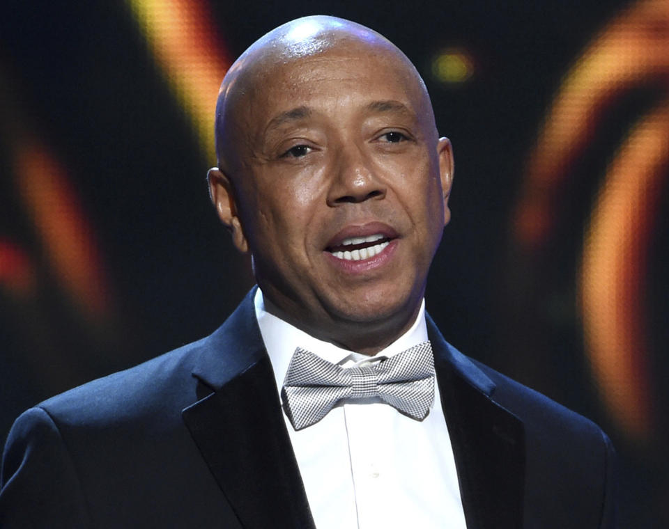 Russell Simmons presents the Vanguard Award on stage at the 46th NAACP Image Awards in Pasadena, Calif. on Feb. 6, 2015