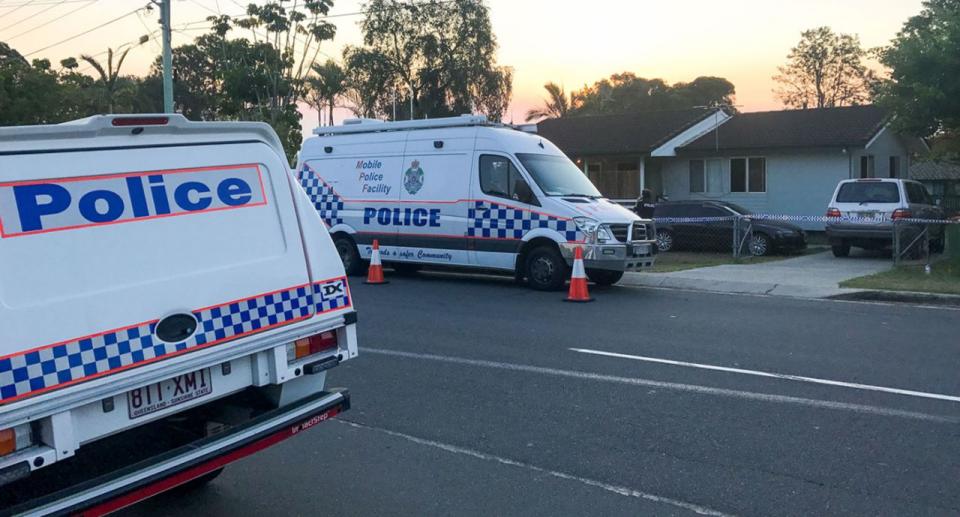 Police vehicles outside the house in Logan where two children died in the hot car. Source: AAP.