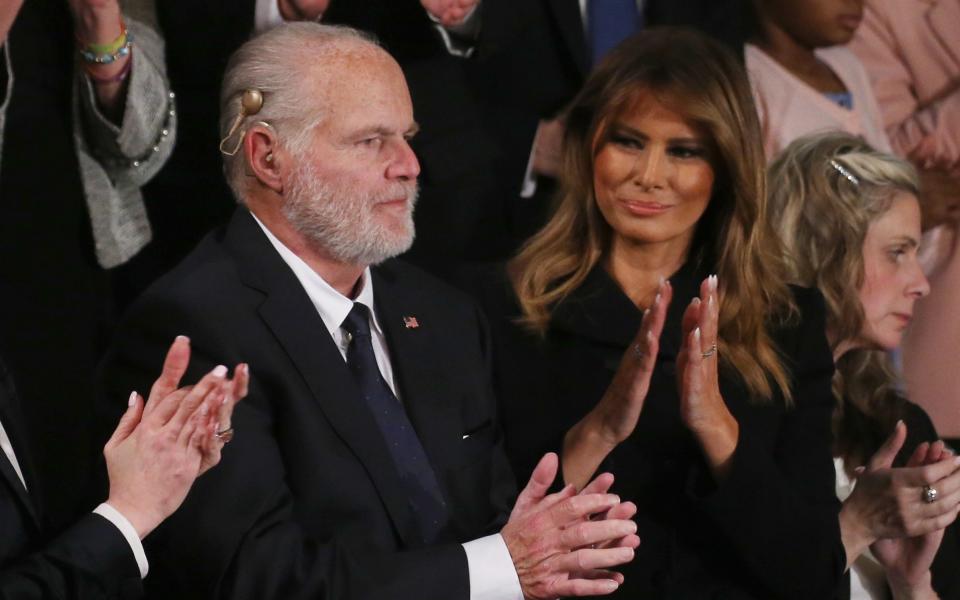 Radio personality Rush Limbaugh reacts after First Lady Melania Trump gives him the Presidential Medal of Freedom during the State of the Union address in the chamber of the U.S. House of Representatives on February 04, 2020 - Mario Tama/Getty Images