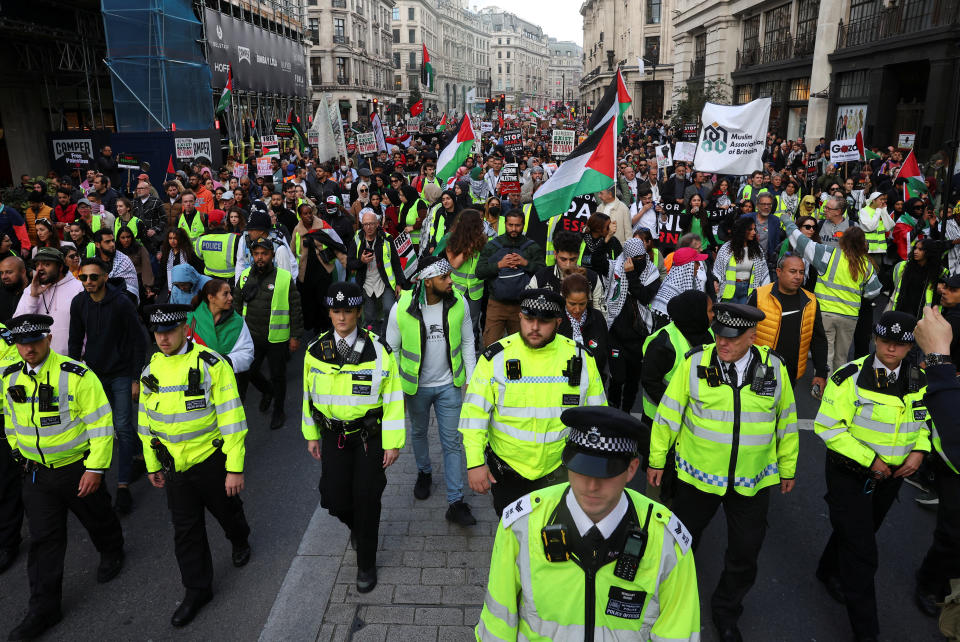 Demonstrators protest in solidarity with Palestinians, amid the ongoing conflict between Israel and the Palestinian Islamist group Hamas, in London, Britain, October 14, 2023. REUTERS/Toby Melville