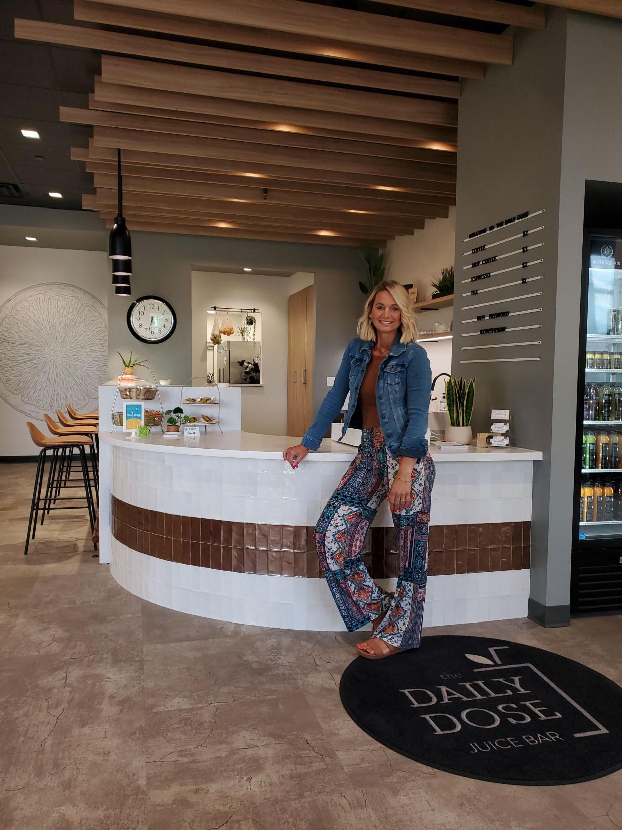 The Daily Dose owner Jenni Dobson is shown at the store's original Slinger location.