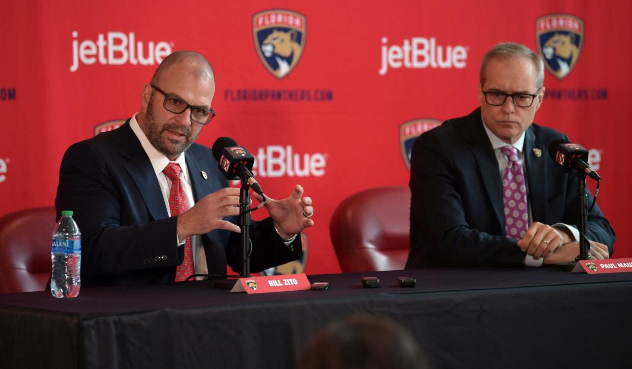 Bill Zito, left, general manager of the Florida Panthers, and Paul Maurice, new head coach of the Panthers, take questions during an NHL hockey news conference at FLA Live Arena, Friday, June 23, 2022, in Sunrise, Fla. (AP Photo/Jim Rassol)