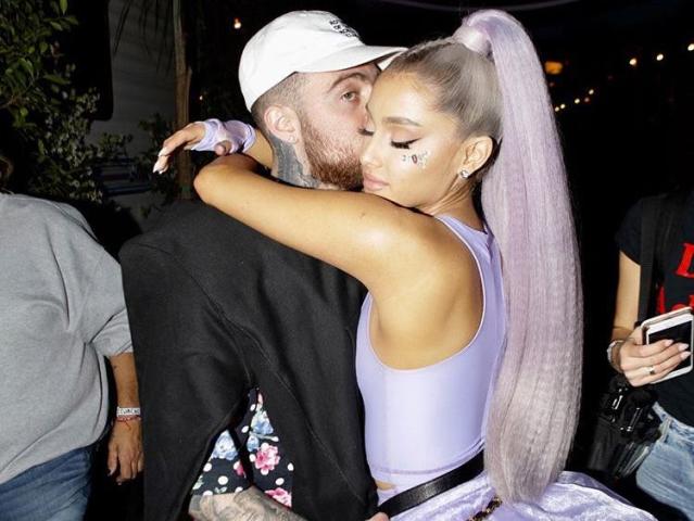 Ariana Grande wears a mask as she spends the day with ex Ricky Alvarez