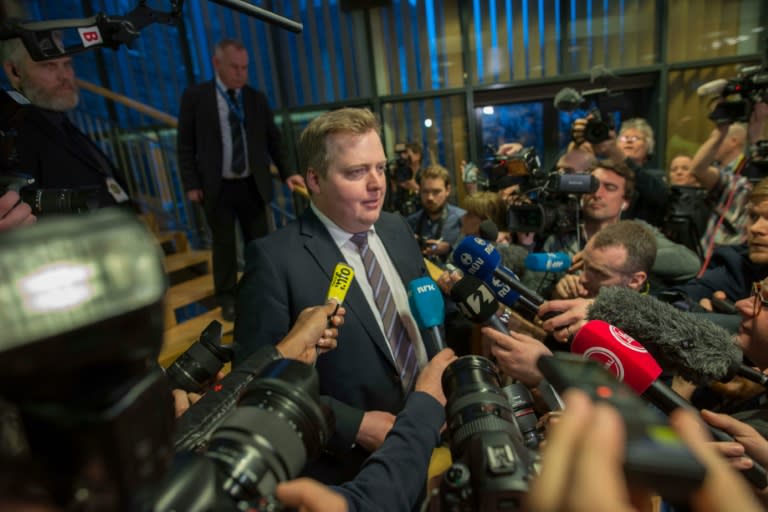 Iceland's former Prime Minister Sigmundur David Gunnlaugsson makes his way past a media scrum after the new prime minister was announced in the parliament in Reykjavik, Iceland on April 6, 2016