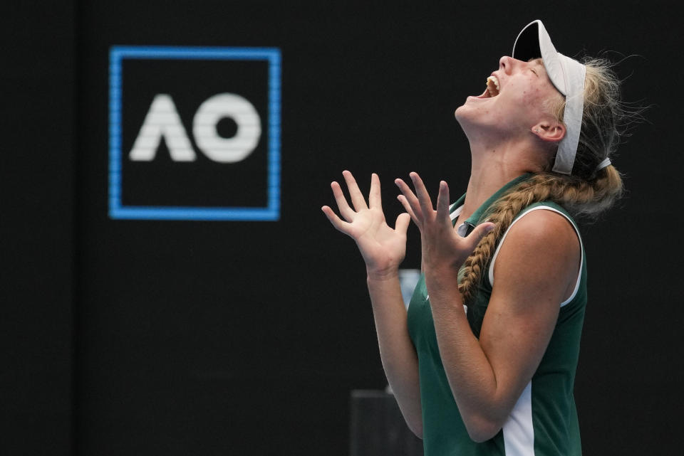 Alina Korneeva of Russia reacts after defeating compatriot Mirra Andreeva in the girls' singles final at the Australian Open tennis championship in Melbourne, Australia, Saturday, Jan. 28, 2023. (AP Photo/Aaron Favila)