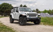 <p>The <a href="https://www.caranddriver.com/jeep/wrangler" rel="nofollow noopener" target="_blank" data-ylk="slk:Jeep Wrangler;elm:context_link;itc:0;sec:content-canvas" class="link ">Jeep Wrangler </a>4xe produces 375 horsepower and 470 pound-feet of torque from its hybrid powertrain. It's not some pavement dweller, either, as the features sheet includes items such as a pair of solid Dana 44 axles, a two-speed transfer case, and more than 10 inches of ground clearance. If you're worried about what dunking your Jeep would do to the electric components, Jeep claims the 4xe's high-voltage parts are sealed and waterproof. Getting out and measuring the puddle with a stick probably wouldn't hurt, though. </p><ul><li>Base price: $56,530</li><li>EPA-rated electric driving range: 22 miles</li></ul><p><a class="link " href="https://www.caranddriver.com/jeep/wrangler/" rel="nofollow noopener" target="_blank" data-ylk="slk:MORE ABOUT THE JEEP WRANGLER 4XE;elm:context_link;itc:0;sec:content-canvas">MORE ABOUT THE JEEP WRANGLER 4XE</a></p>