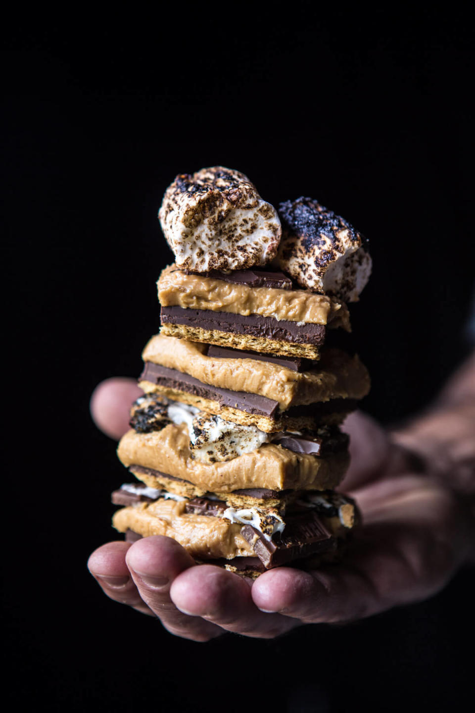 <strong>Get the <a href="https://www.halfbakedharvest.com/no-bake-triple-decker-peanut-butter-smores-bars/" target="_blank">No-Bake Triple Decker Peanut Butter S&rsquo;mores Bars recipe</a>&nbsp;from Half Baked Harvest</strong>