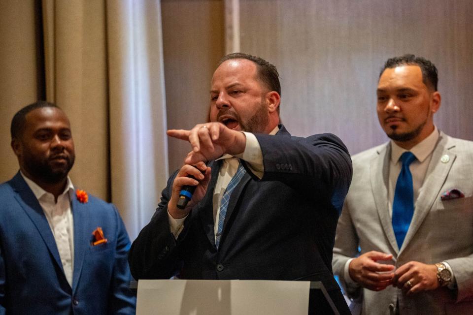 Columbus City Councilmember Emmanuel Remy thanks his supporters for his reelection win Tuesday, Nov. 7, 2023, at the Franklin County Democratic Party election watch celebration at the Junto Hotel.