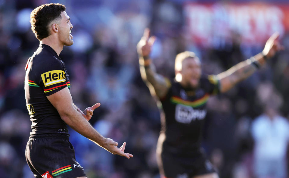 Nathan Cleary, pictured here celebrating after nailing the game-winning field-goal for the Panthers.