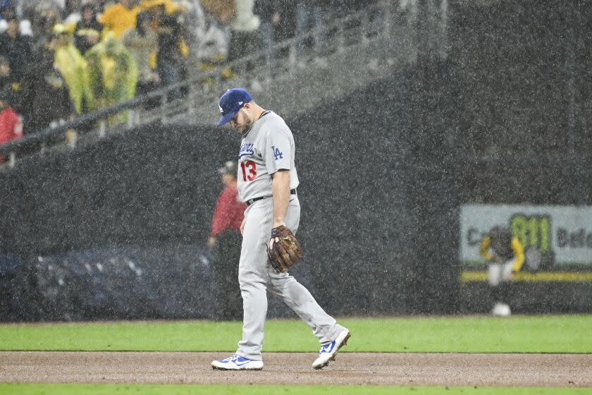 San Diego, CA - October 15: Los Angeles Dodgers second baseman Max Muncy walks on the field.
