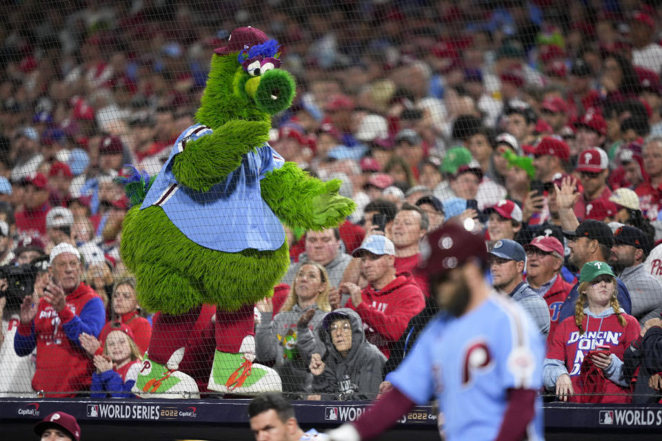 The Philly Phanatic walks on the dugout during the eighth inning in Game 5 of baseball's World Series between the Houston Astros and the Philadelphia Phillies on Thursday, Nov. 3, 2022, in Philadelphia. (AP Photo/Matt Slocum)