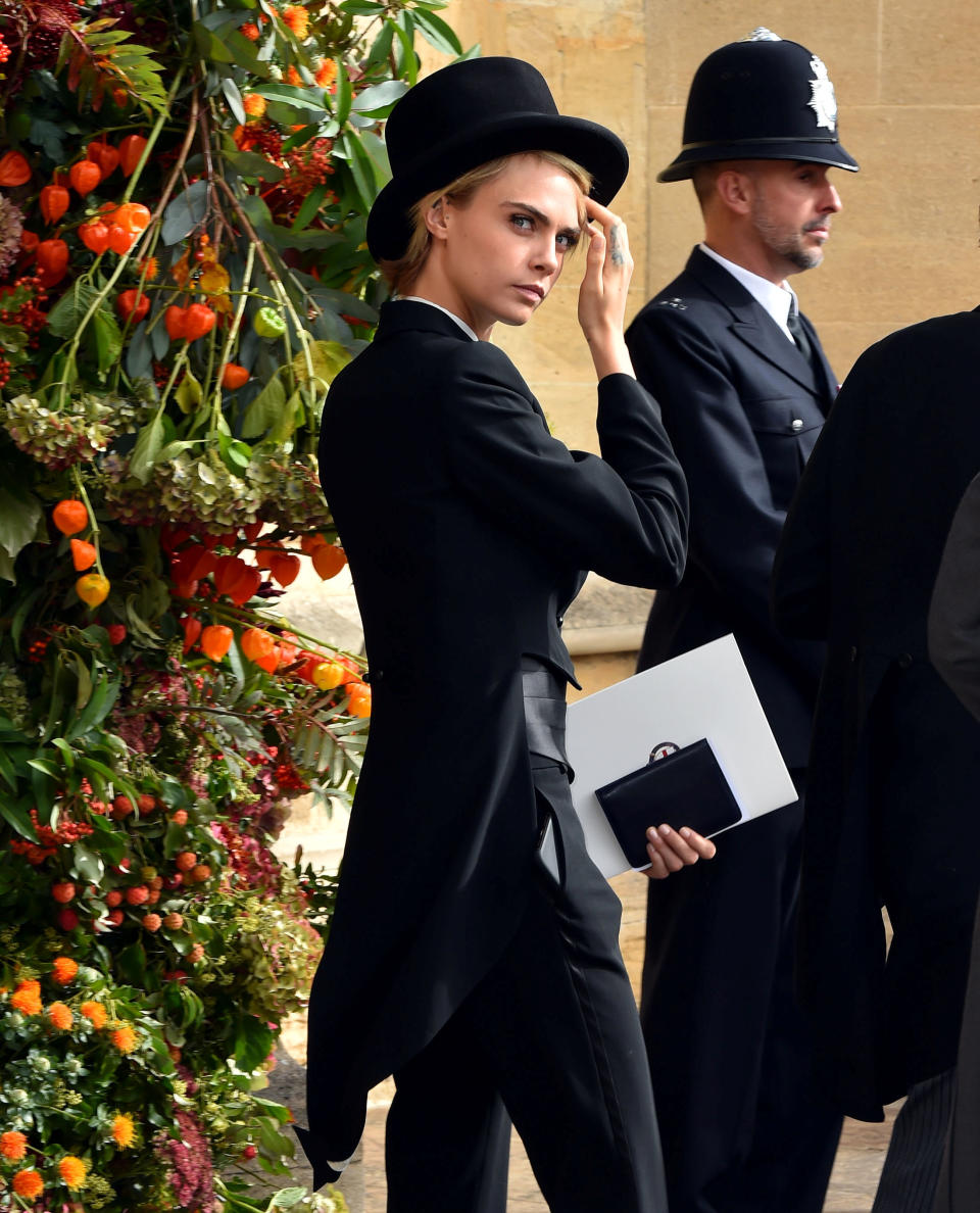 Model Cara Delevingne makes her way to the nuptials.&nbsp;