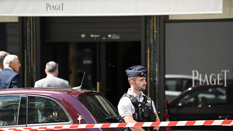 A police officer outside of Piaget's Paris flagship
