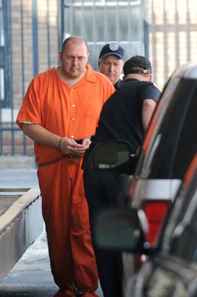 PHOTO: In this March 18, 2011 file photo Michael Carneal is escorted by a guard from the District Courthouse in Paducah, Ky. (Stephen Lance Dennee/The Paducah Sun via AP, FILE)