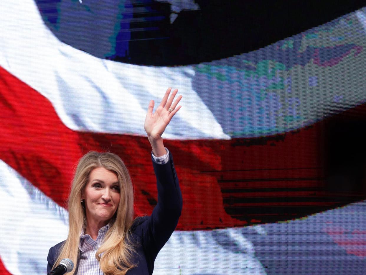 Then-Republican Sen. Kelly Loeffler of Georgia waves to supporters during a runoff election night party at the Grand Hyatt Hotel in Buckhead on January 6, 2021 in Atlanta, Georgia.