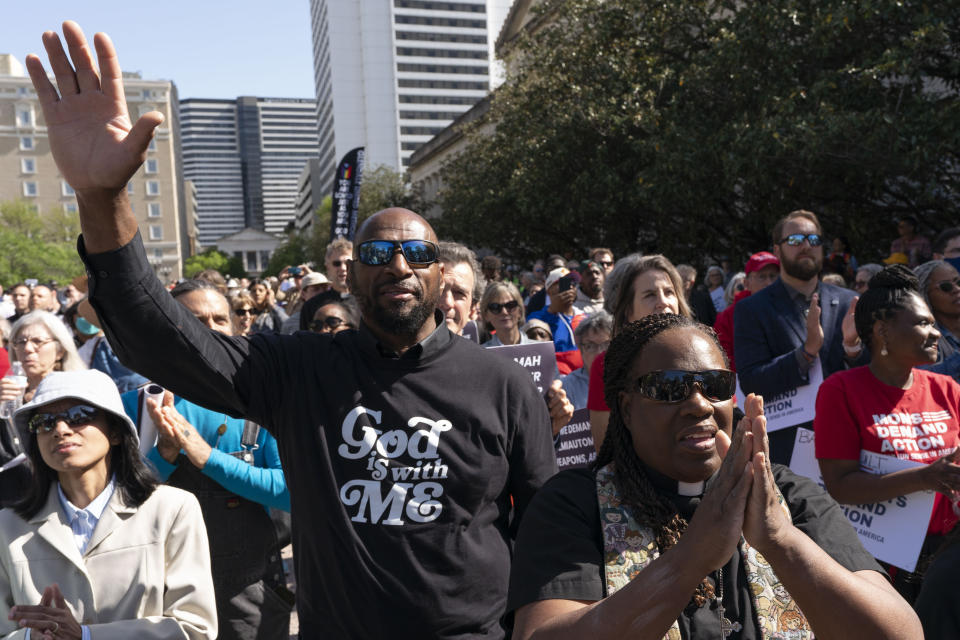 Bobby Lee Smith and Rev. Paula Smith attend the Tennessee Moral Monday rally protesting gun violence outside the state Capitol, Monday, April 17, 2023, in Nashville, Tenn. (AP Photo/George Walker IV)