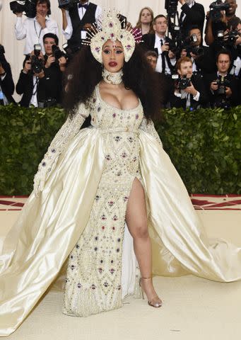 <p>Frazer Harrison / FilmMagic / Getty Images</p> Cardi B attends the Met Gala in 2018