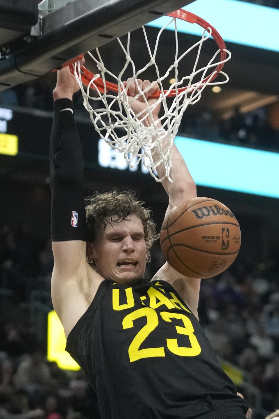 Utah Jazz forward Lauri Markkanen (23) dunks against the San Antonio Spurs during the first half of an NBA basketball game Wednesday, March 27, 2024, in Salt Lake City. (AP Photo/Rick Bowmer)