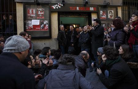 Pablo Iglesias (C), head of leftist group "Podemos", or "We Can" receives applauds after the presentation of the party in Madrid January 17, 2014. REUTERS/Andrea Comas