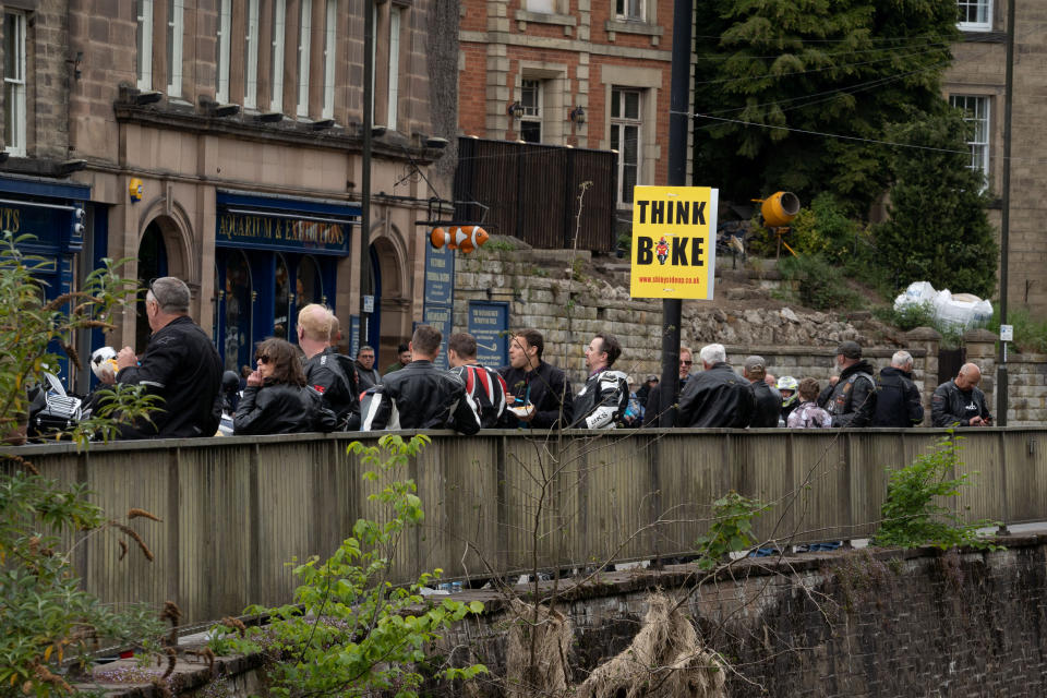 People mill around in Matlock Bath as the parish council leader asked visitors to stay away. (Tom Maddick / SWNS)