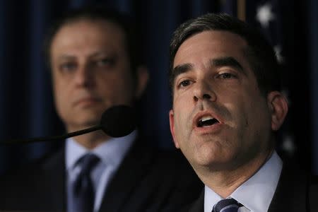 Andrew Ceresney (R), Director of SEC Enforcement division, speaks as Preet Bharara, U.S. Attorney for the Southern District of New York, looks on during a news conference regarding Las Vegas sports bettor William "Billy" Walters and Dean Food's former chairman Thomas Davis, both charged with insider trading, in New York City, U.S. May 19, 2016. REUTERS/Brendan McDermid