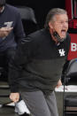 Kentucky head coach Jon Calipari yells to his team on the floor during the first half of an NCAA college basketball game against Georgia Tech, Sunday, Dec. 6, 2020, in Atlanta. (AP Photo/John Bazemore)